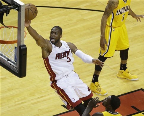 For the first time in four NBA Finals appearances, Dwyane Wade enters the series as a question mark for Miami's success. (Photo by Wilfredo Lee, Associated Press)